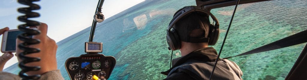 man inside a helicopter