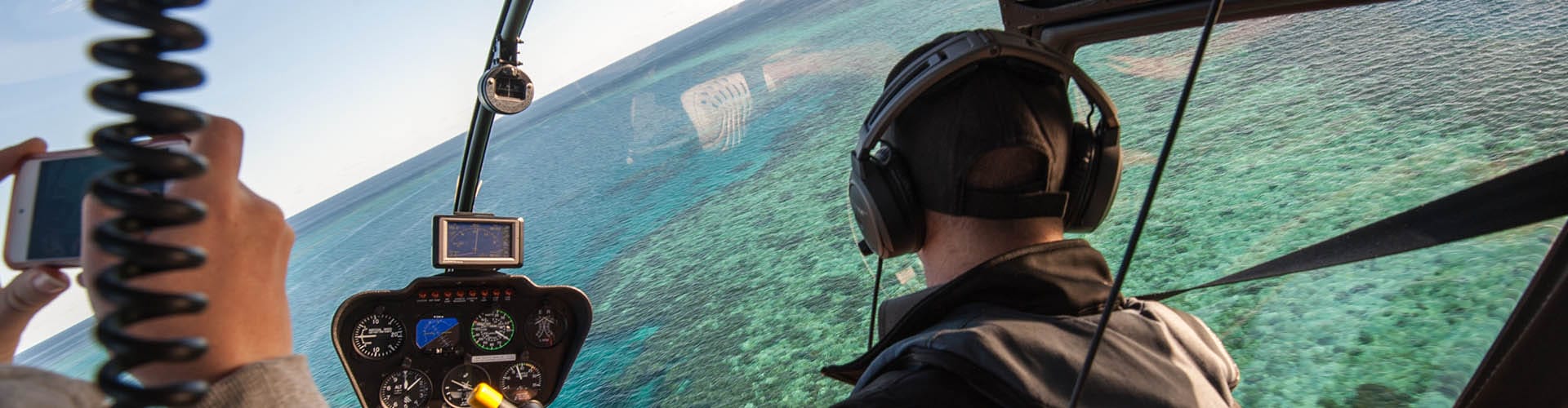 man inside a helicopter