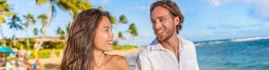 man and woman looking at each other smiling