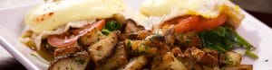 potato and eggs decoratively placed on a plate