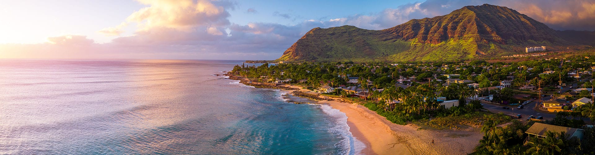 sunset backdrop of kauai shore