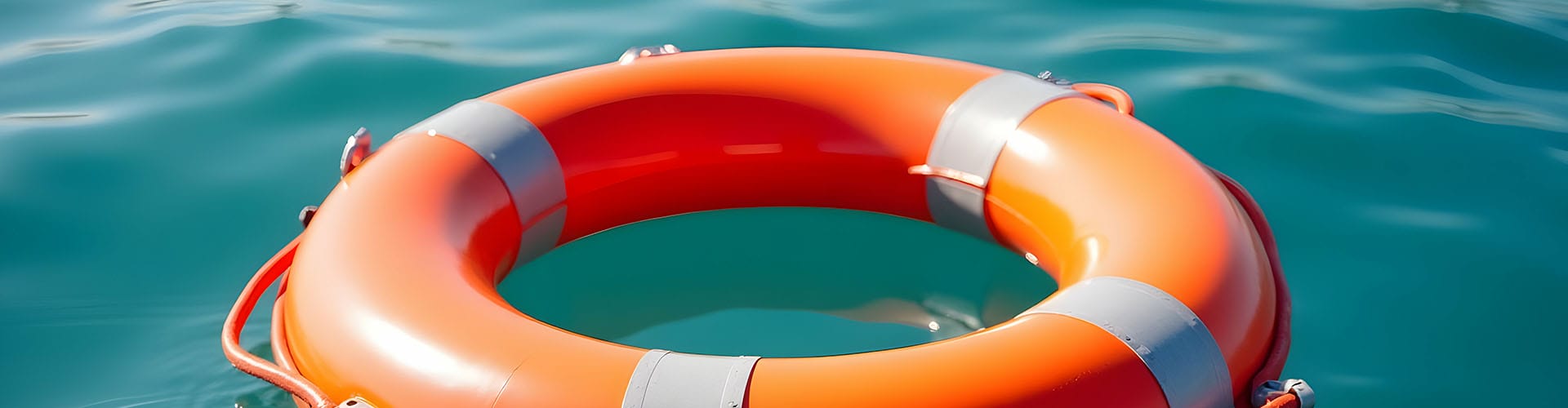 orange buoy in water